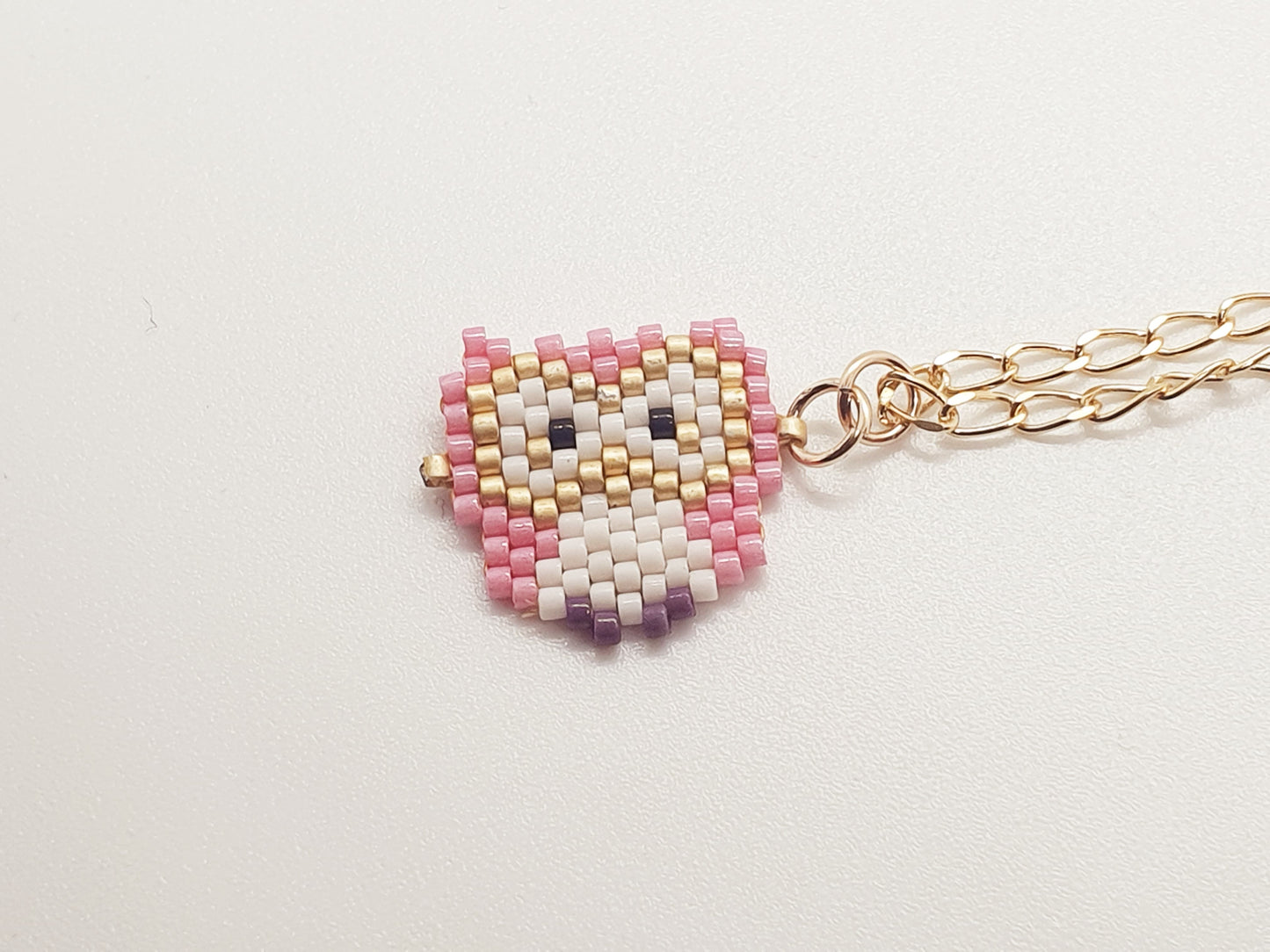 Collier enfant avec pendentif tissé hiboux